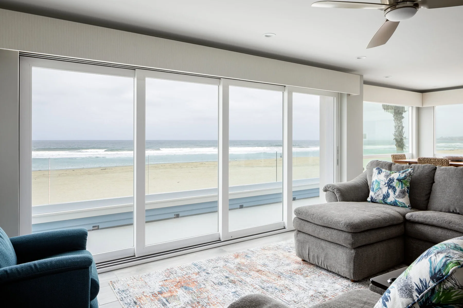 Win-Dor 3750 multi-slide door opening to a broad outdoor view