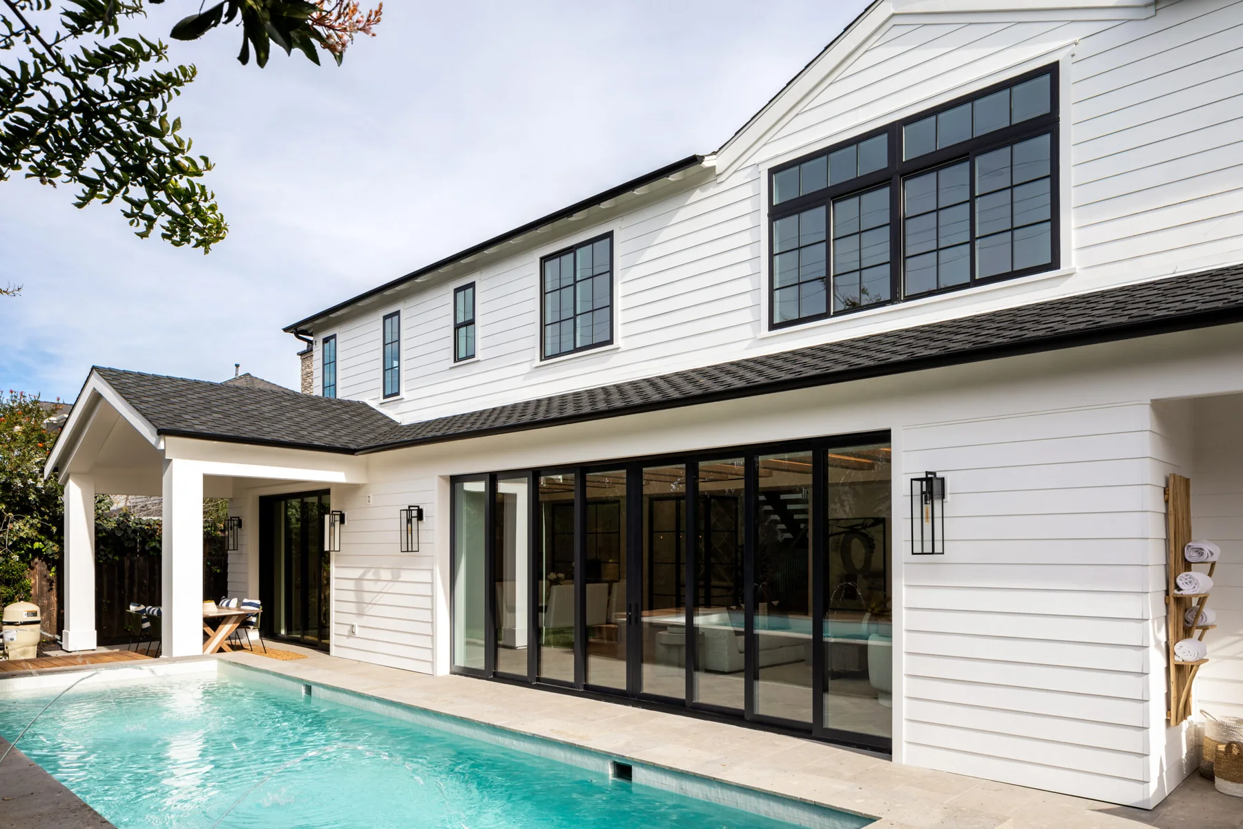 Black eight-panel WinDor 3750 pocketing multi-slide door