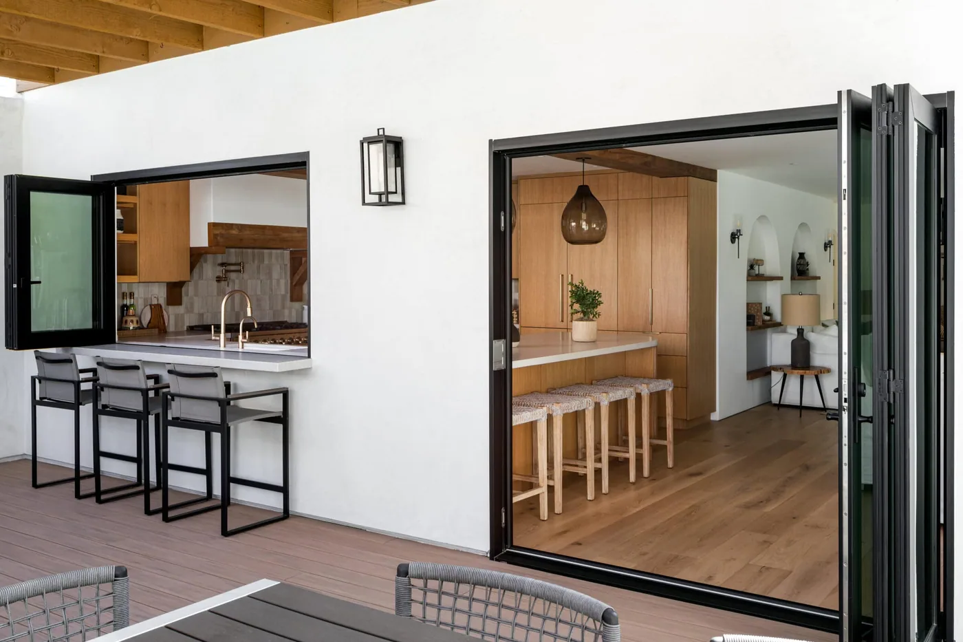Win-Dor 3750 folding door system opened toward a patio